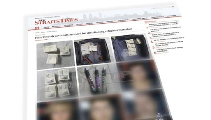 Screen capture Strait Times soal penangkapan warga Finlandia yang diduga sebarkan materi agama Kristen.