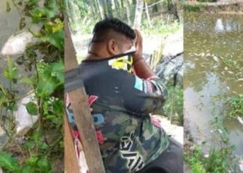 Zainundin Khozen menangis saat ikan-ikan miliknya mati. Foto: Facebook