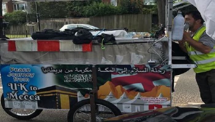 Kisah Adam Muhammad, Muslim Inggris yang Jalan Kaki untuk Naik Haji 1 jalan kaki untuk naik haji, jalan kaki dorong gerobak muslim berhaji ke mekah